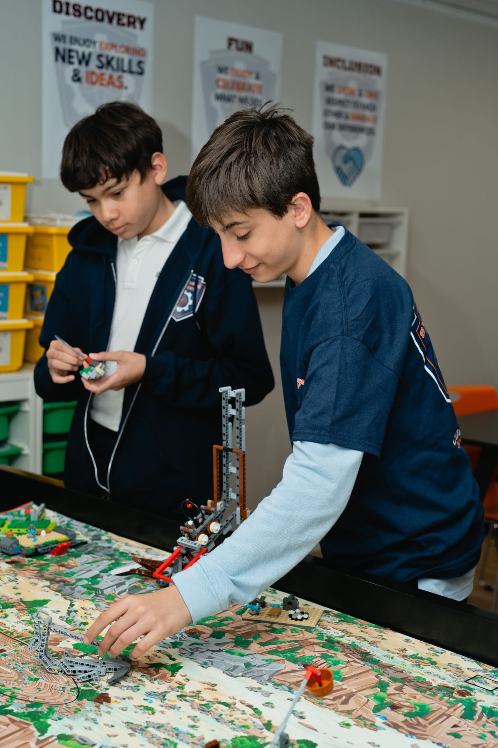 STEM Operatives students working on advanced robotics build